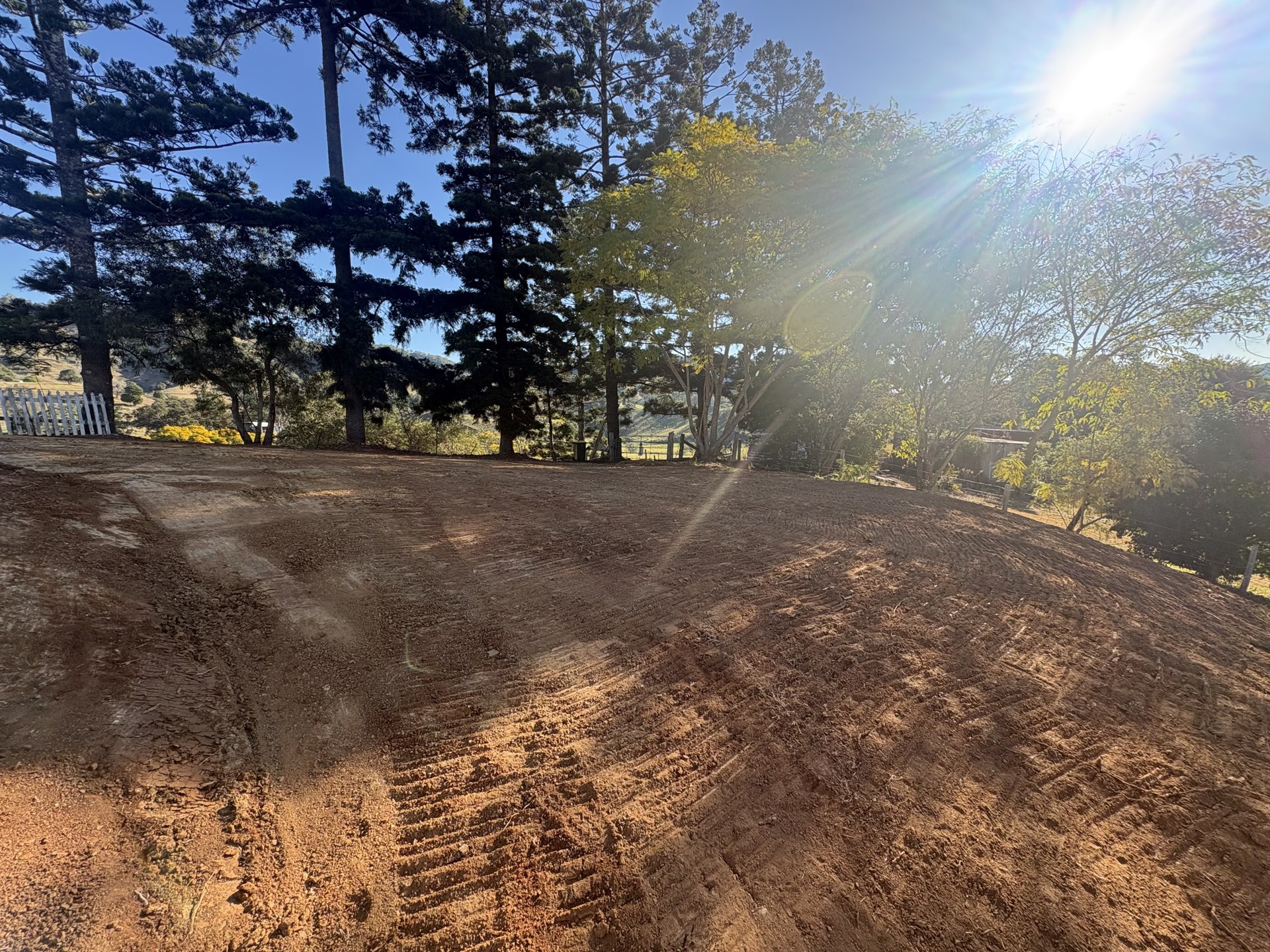 Gravel driveway with shaped shoulders and drainage at Langshaw QLD
