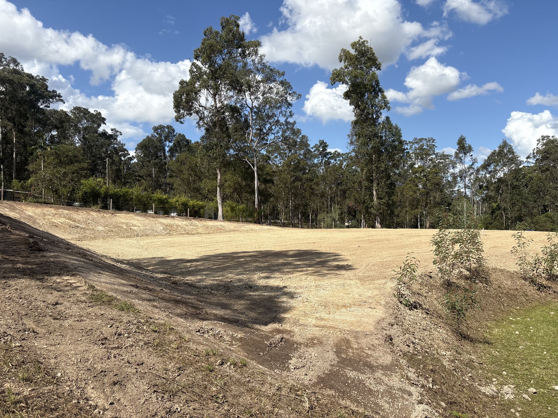 Shed pad with shaped batter and drainage after excavation near Gympie QLD