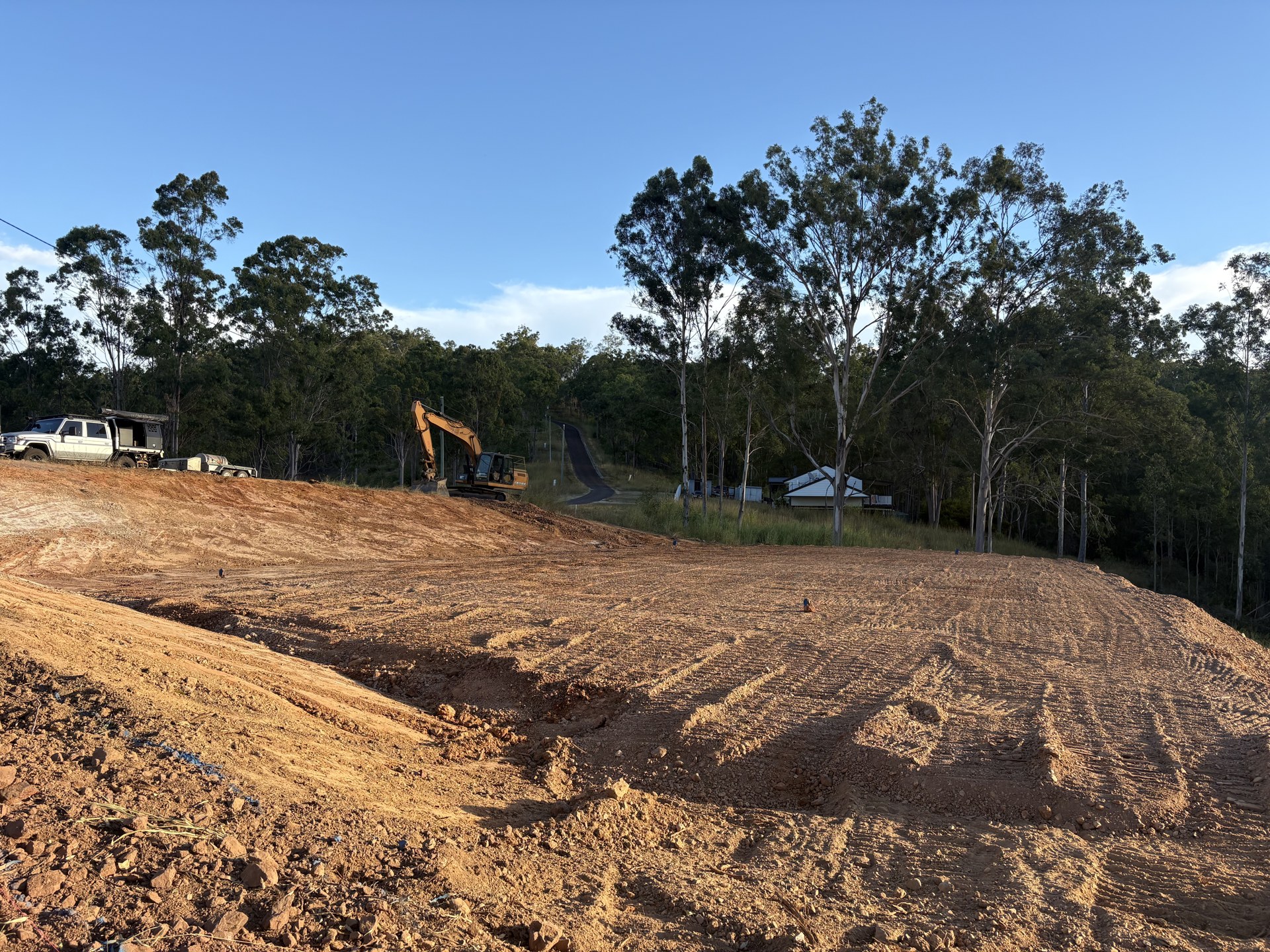 Completed cut and fill house pad with graded batters at Glastonbury QLD