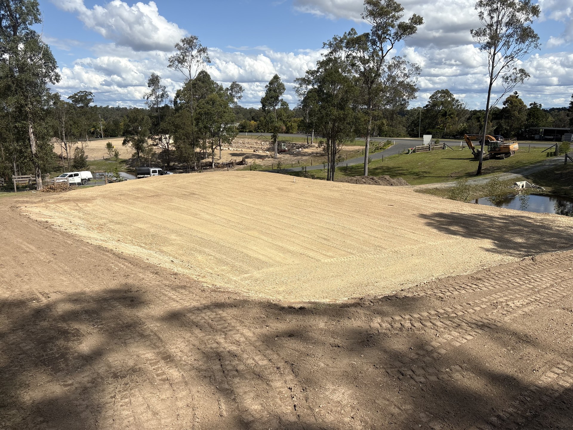 Level compacted shed pad after site cut works near Gympie QLD