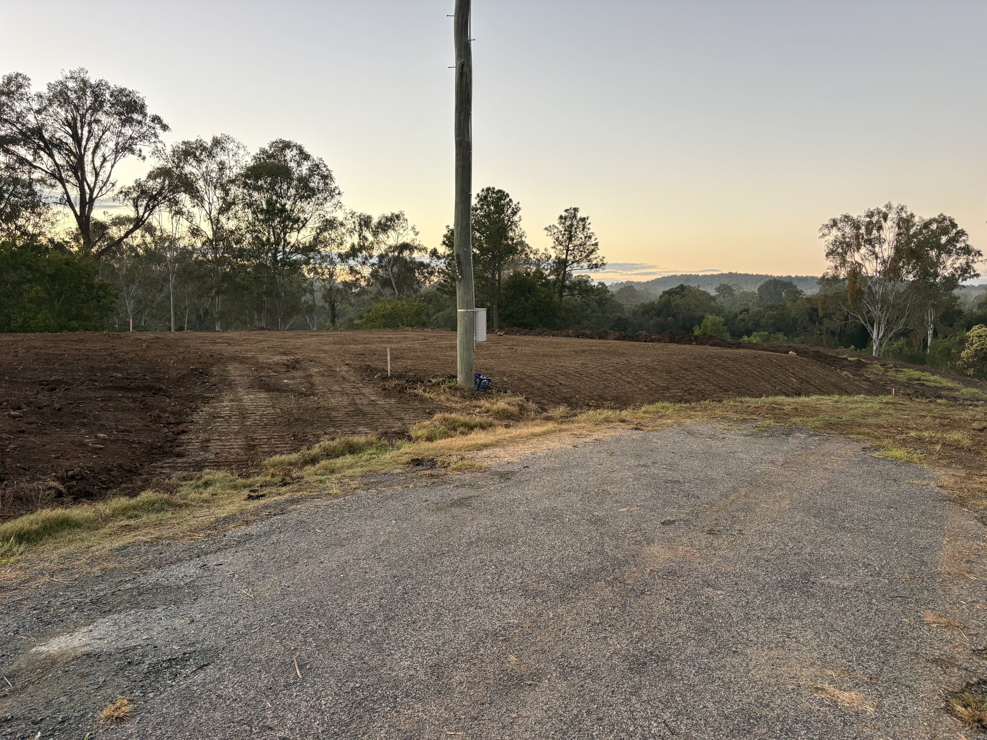 Completed level pad with drainage fall at Mothar Mountain QLD