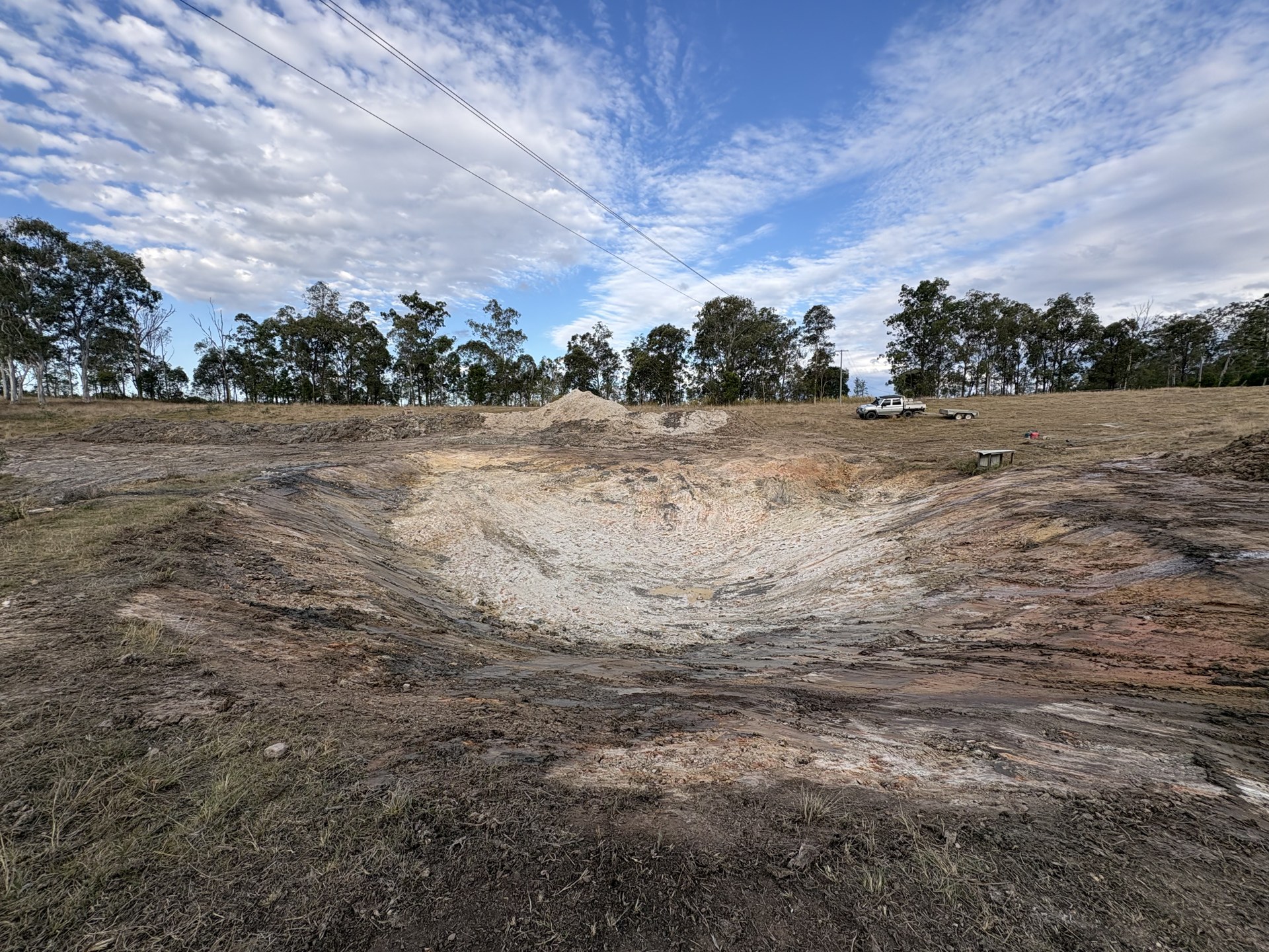 Finished dam and levelled surrounds after earthmoving at Corella QLD